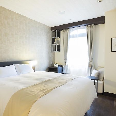 En Hotel Fujisawa Extérieur photo